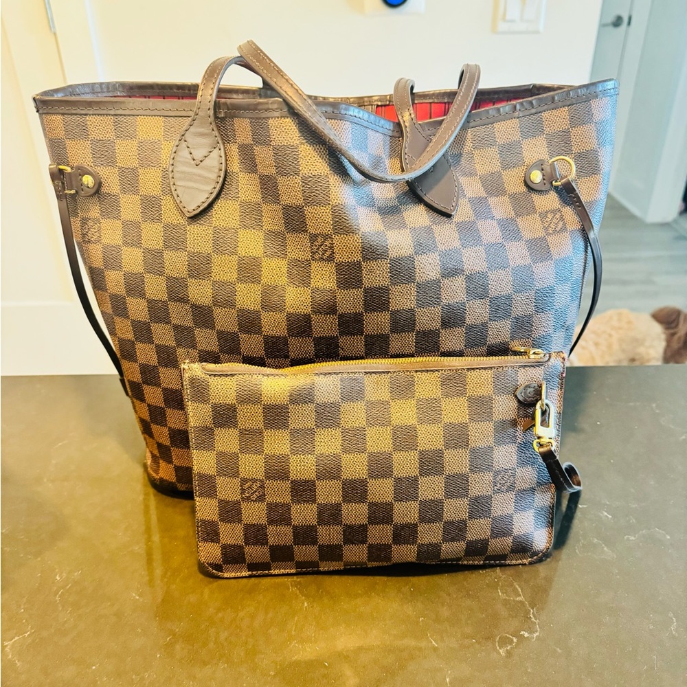 Louis Vuitton Neverfull MM in the classic Ebene Damier with the Cherry interior